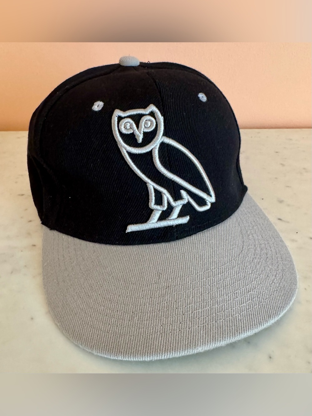 Octobers Very Own OVO Classic Snapback Cap with Iconic Owl Logo, Black and Grey
